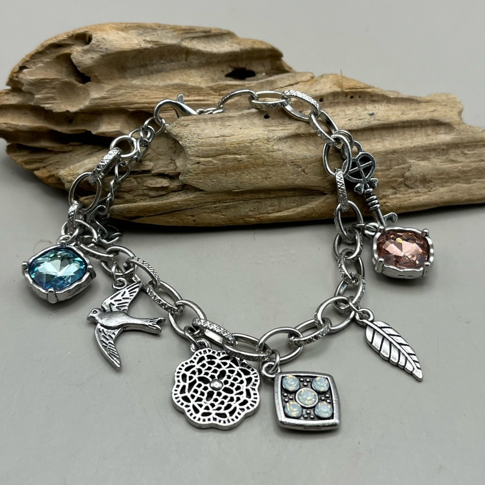 Silver Charm Bracelet with Blue and Pink Accents
